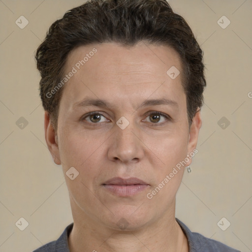 Joyful white adult female with short  brown hair and brown eyes