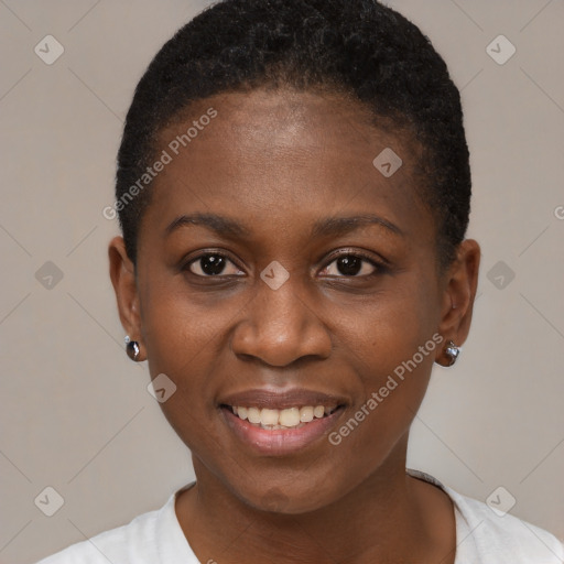 Joyful black young-adult female with short  brown hair and brown eyes