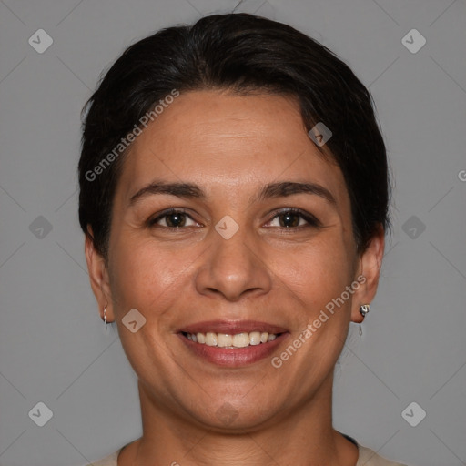 Joyful white adult female with short  brown hair and brown eyes