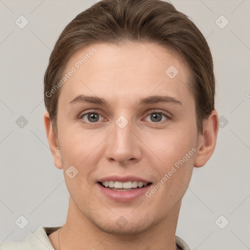 Joyful white young-adult female with short  brown hair and grey eyes