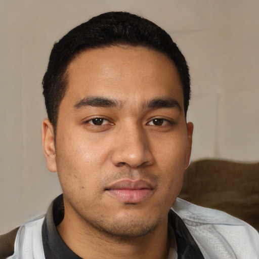 Neutral white young-adult male with short  black hair and brown eyes