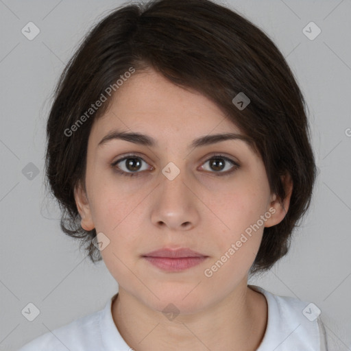 Neutral white young-adult female with medium  brown hair and brown eyes