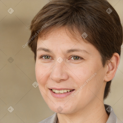 Joyful white adult female with short  brown hair and brown eyes