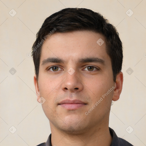 Neutral white young-adult male with short  brown hair and brown eyes