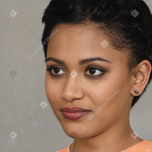 Joyful latino young-adult female with short  black hair and brown eyes