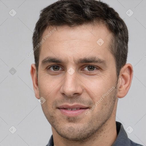 Joyful white young-adult male with short  brown hair and brown eyes