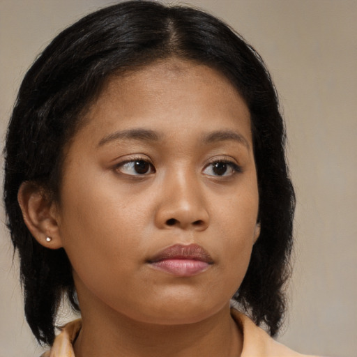 Neutral asian young-adult female with medium  brown hair and brown eyes