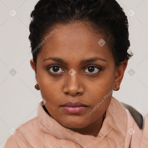 Neutral black young-adult female with short  brown hair and brown eyes