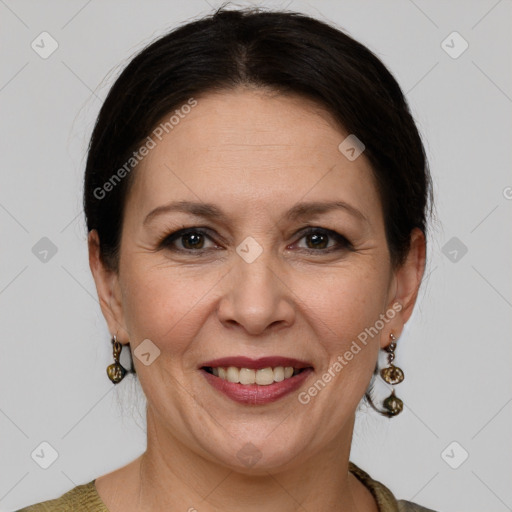 Joyful white adult female with medium  brown hair and grey eyes