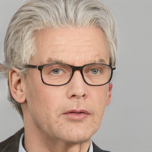 Neutral white middle-aged male with short  gray hair and blue eyes