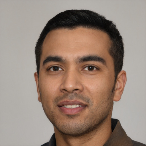 Neutral latino young-adult male with short  black hair and brown eyes