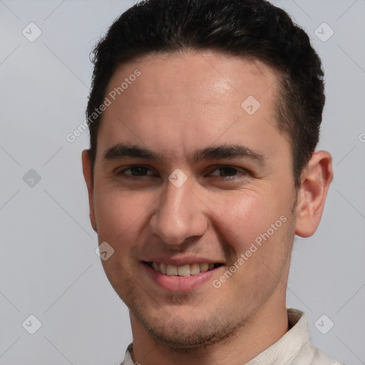 Joyful white young-adult male with short  brown hair and brown eyes