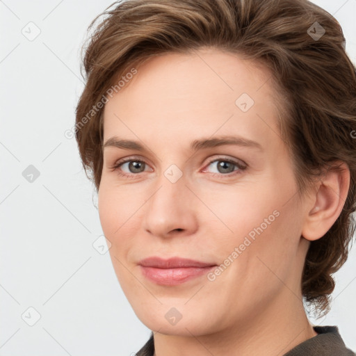 Joyful white young-adult female with medium  brown hair and blue eyes