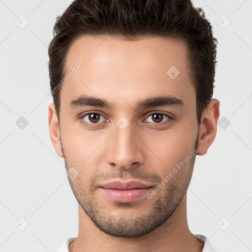 Neutral white young-adult male with short  brown hair and brown eyes