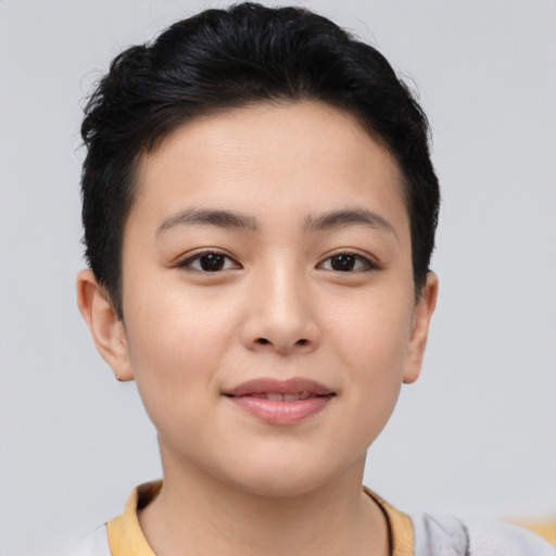 Joyful asian young-adult female with short  brown hair and brown eyes