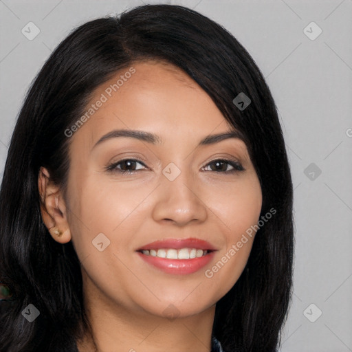 Joyful latino young-adult female with long  black hair and brown eyes