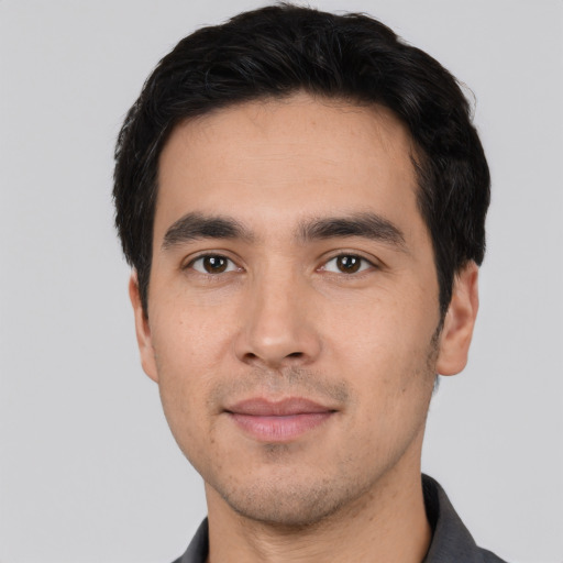 Neutral white young-adult male with short  black hair and brown eyes