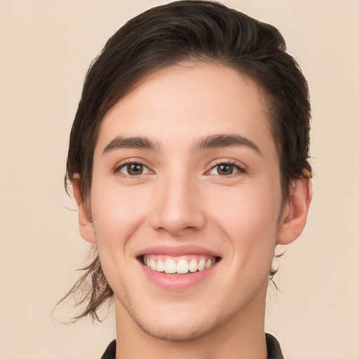 Joyful white young-adult male with medium  brown hair and brown eyes