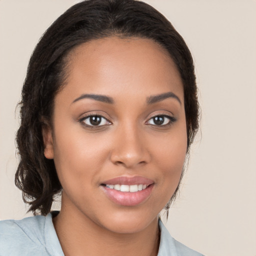 Joyful white young-adult female with medium  brown hair and brown eyes