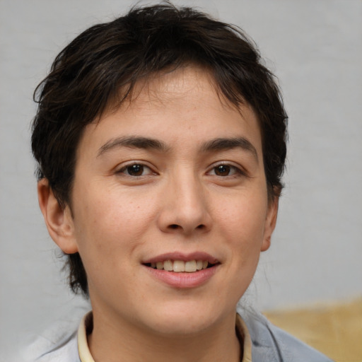 Joyful white young-adult male with medium  brown hair and brown eyes