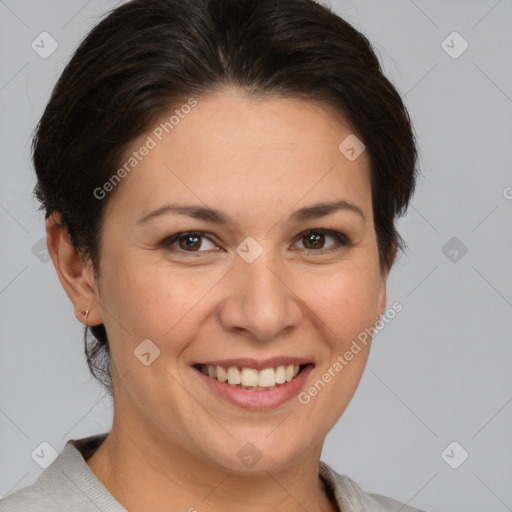 Joyful white adult female with medium  brown hair and brown eyes