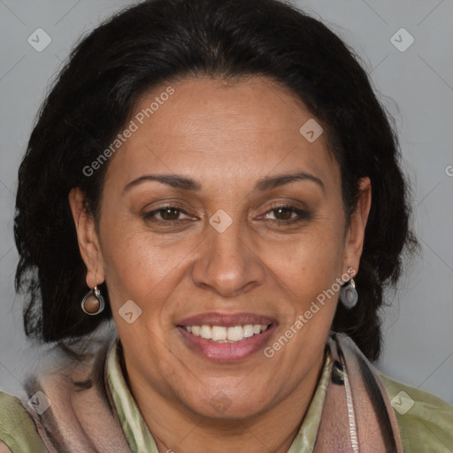 Joyful latino adult female with medium  brown hair and brown eyes