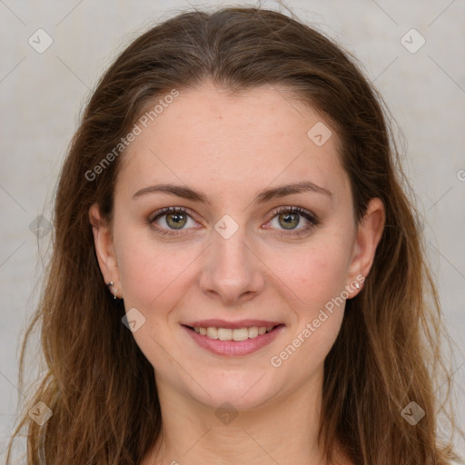 Joyful white young-adult female with long  brown hair and green eyes