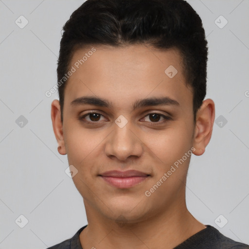 Joyful latino young-adult male with short  black hair and brown eyes