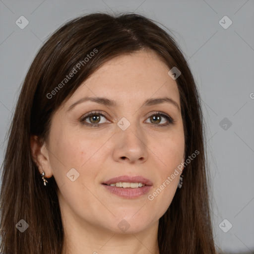 Joyful white young-adult female with long  brown hair and brown eyes