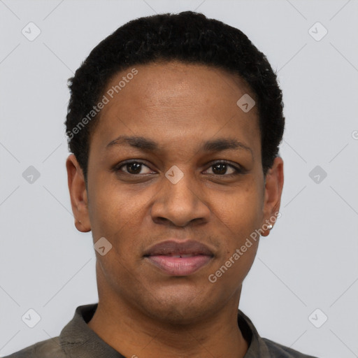 Joyful black young-adult female with short  black hair and brown eyes