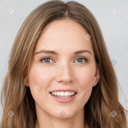 Joyful white young-adult female with long  brown hair and green eyes