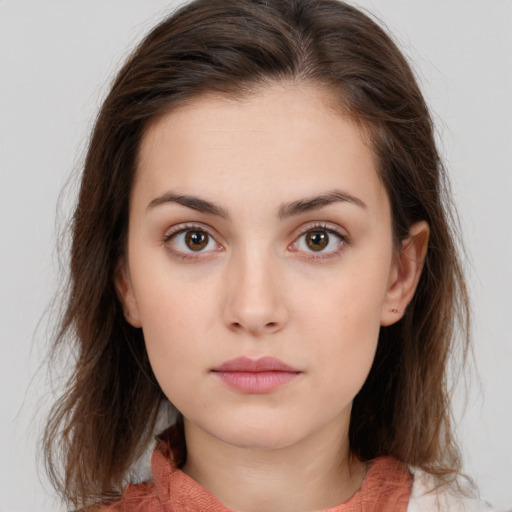 Neutral white young-adult female with medium  brown hair and brown eyes