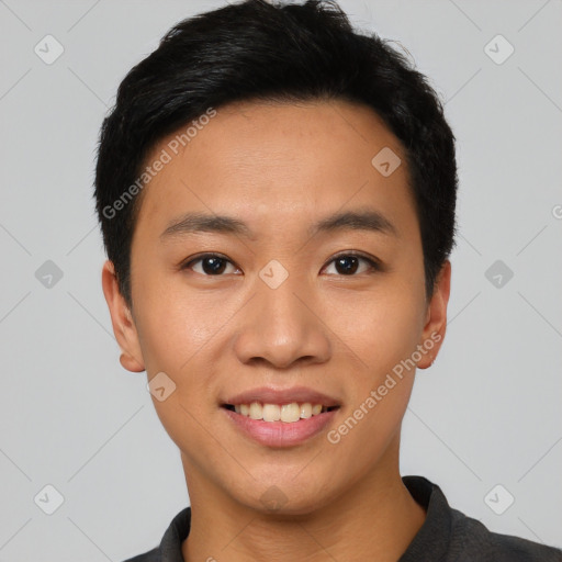 Joyful asian young-adult male with short  black hair and brown eyes