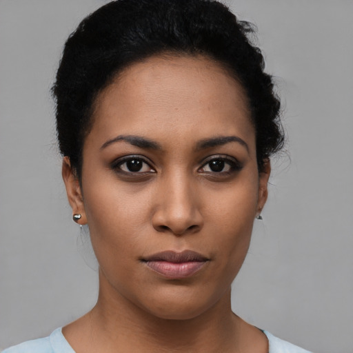 Neutral latino young-adult female with short  brown hair and brown eyes