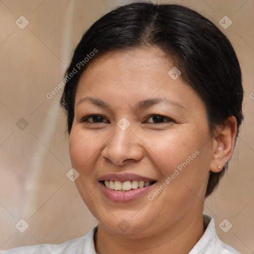 Joyful white adult female with medium  brown hair and brown eyes