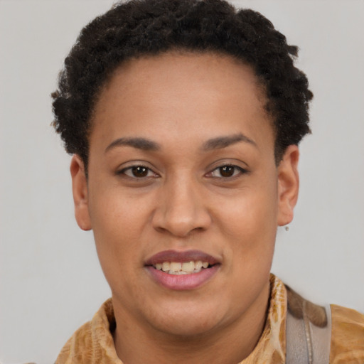 Joyful latino young-adult female with short  brown hair and brown eyes