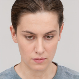 Neutral white young-adult female with short  brown hair and grey eyes