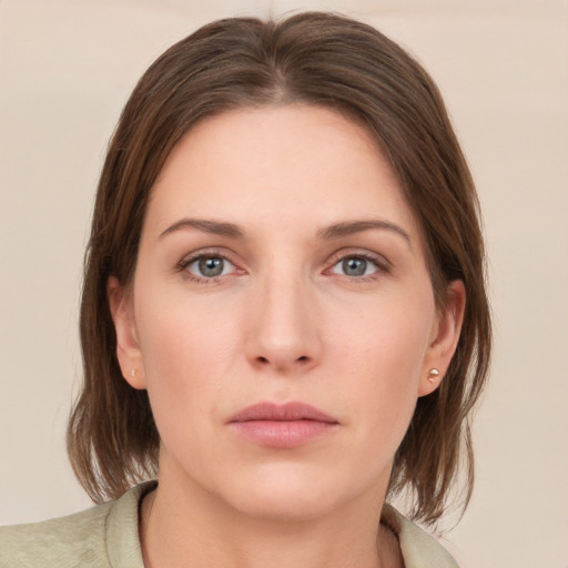 Neutral white young-adult female with medium  brown hair and brown eyes