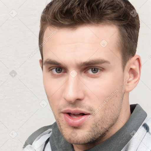 Neutral white young-adult male with short  brown hair and brown eyes