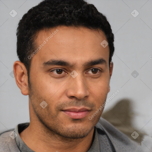 Neutral latino young-adult male with short  brown hair and brown eyes