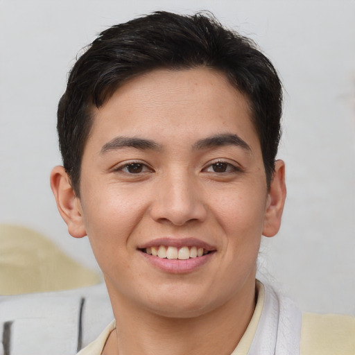 Joyful asian young-adult female with short  brown hair and brown eyes