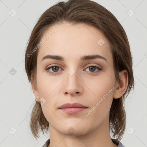 Neutral white young-adult female with medium  brown hair and grey eyes