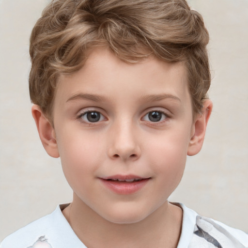 Joyful white child male with short  brown hair and grey eyes