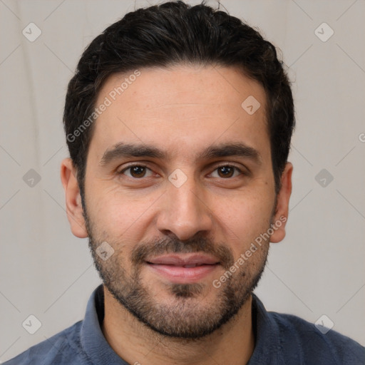 Joyful white young-adult male with short  black hair and brown eyes