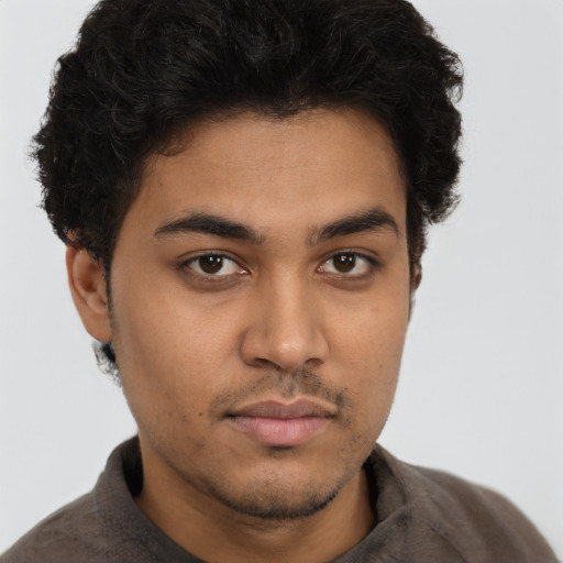 Neutral latino young-adult male with short  brown hair and brown eyes