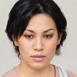 Neutral asian young-adult female with medium  brown hair and brown eyes