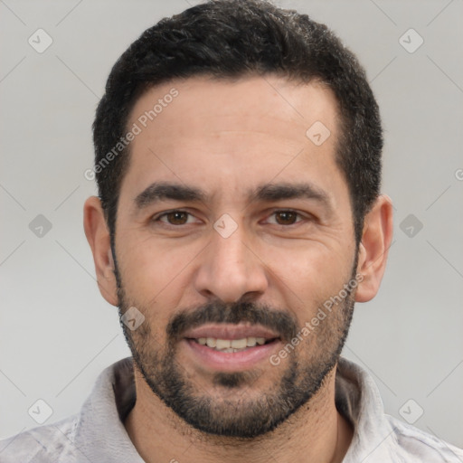 Joyful white young-adult male with short  black hair and brown eyes