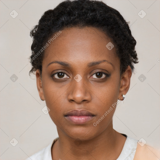 Neutral black young-adult female with short  black hair and brown eyes