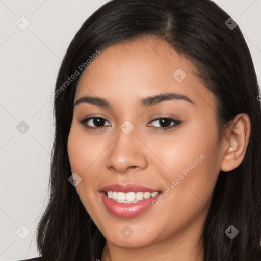 Joyful latino young-adult female with long  brown hair and brown eyes