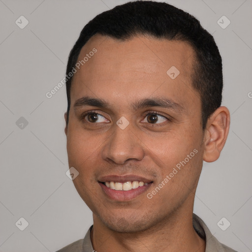 Joyful latino young-adult male with short  black hair and brown eyes